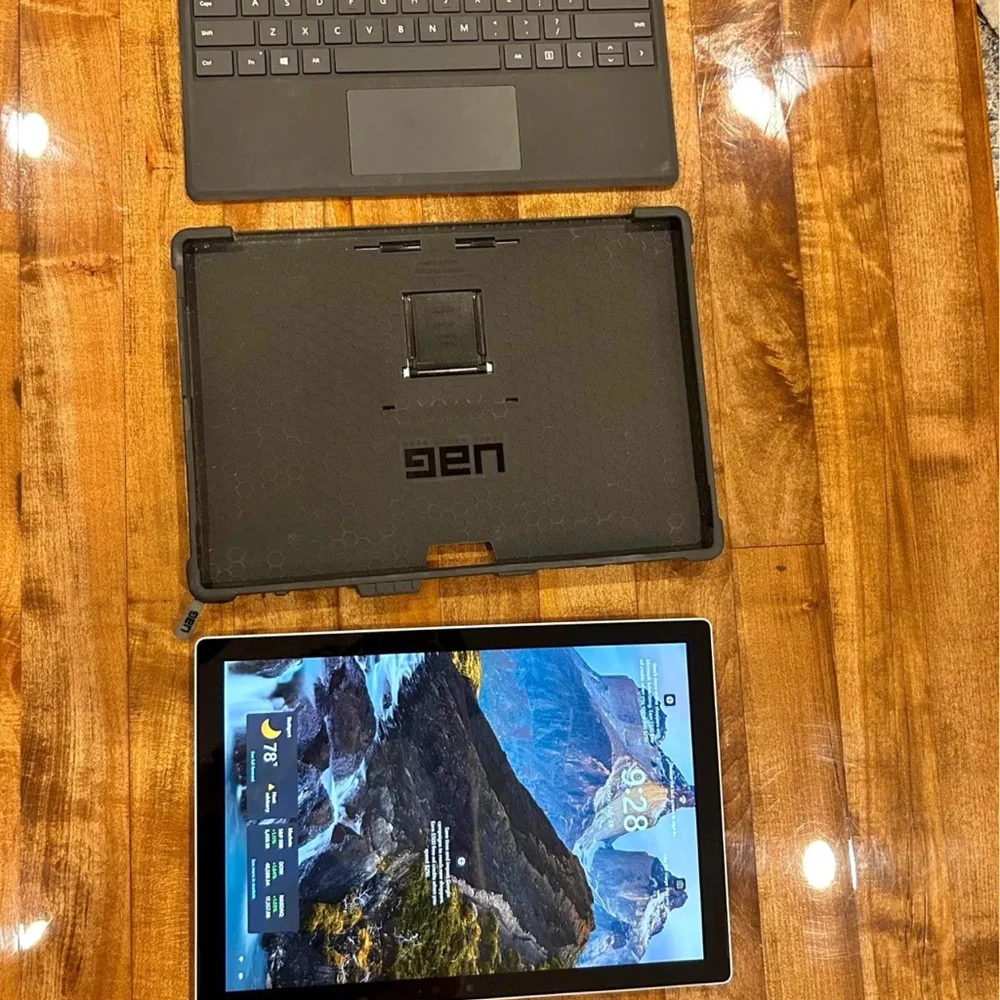 Microsoft Surface Pro 7, keyboard, case, pen, and charger